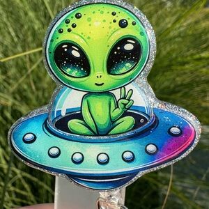 Alien “I come in peace” badge reel